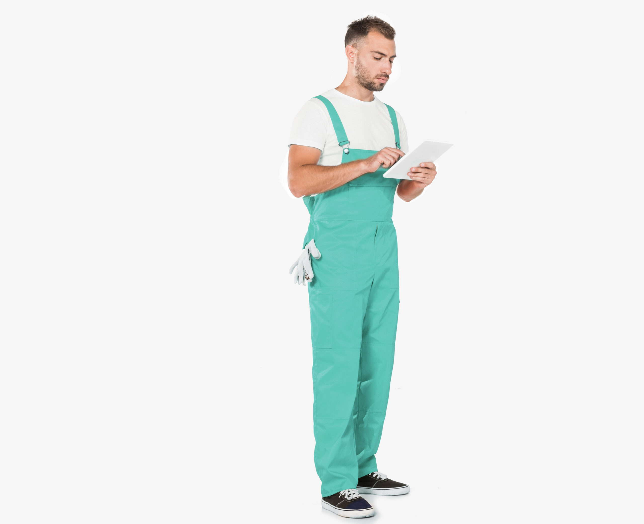 A mechanic in green overalls.